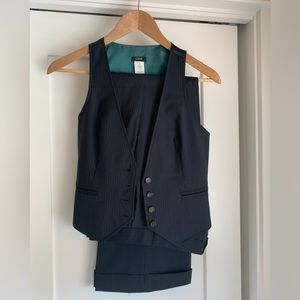 Navy blue pinstriped dress pants and vest